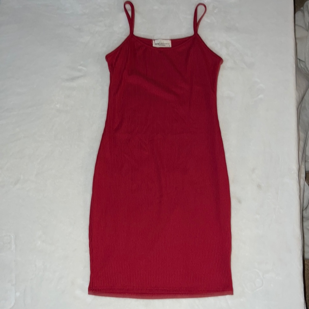 Small fitted dress with light jacket